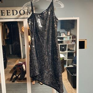 Sequence sparkly dress. Longer on one side and different dimension at top